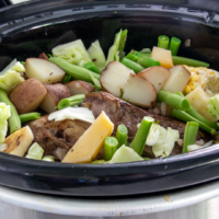 crockpot full of food ready to be made into a crock pot recipes