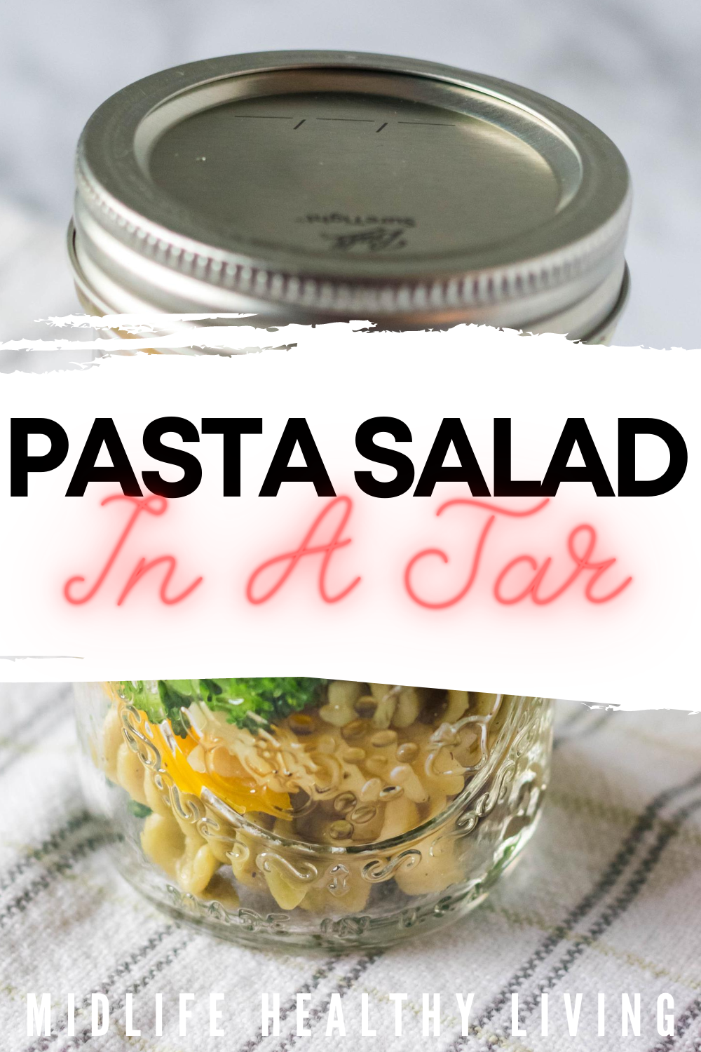 Pin showing the finished pasta salad in a jar ready to eat.