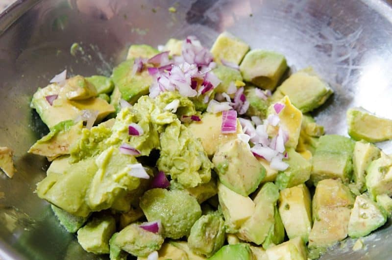 Homemade Guacamole is an easy to make recipe that is low in points and packed with added nutritional value. Fruit, veggie, who cares! Avocados are delicious