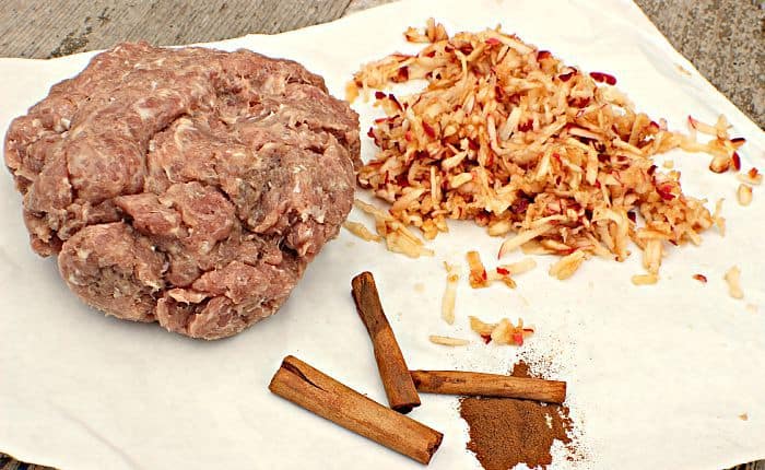ingredients pictured: fresh turkey sausage, grated apple and cinnamon 