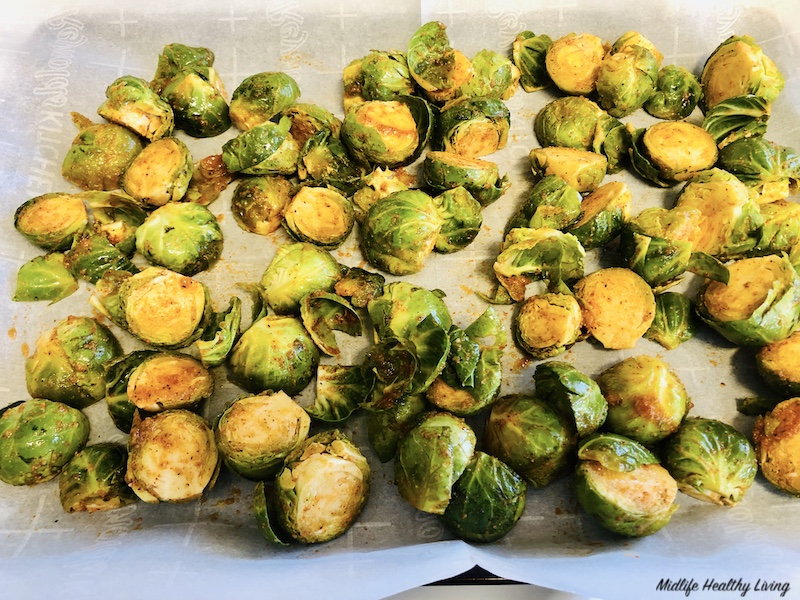 brussels sprouts on a tray ready to roast