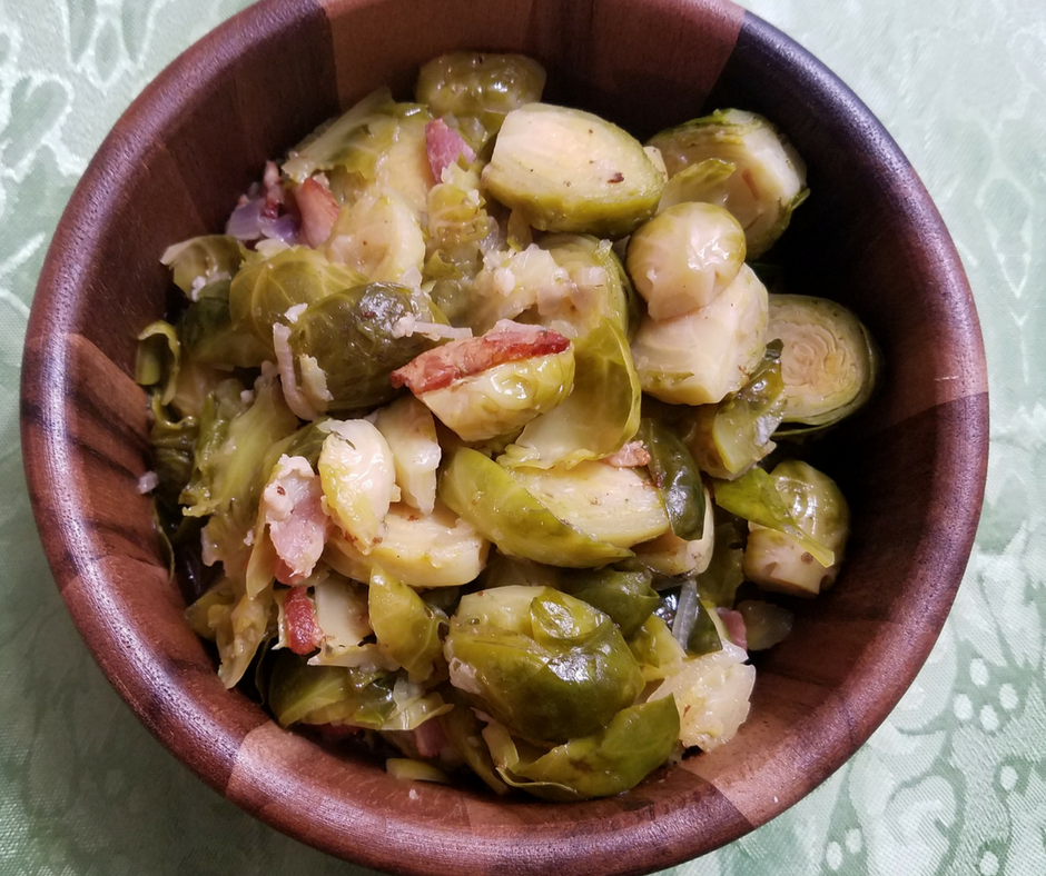 Instant Pot Brussels Sprouts with Bacon and Garlic are the perfect side dish for any meal! Make these in just a few minutes!