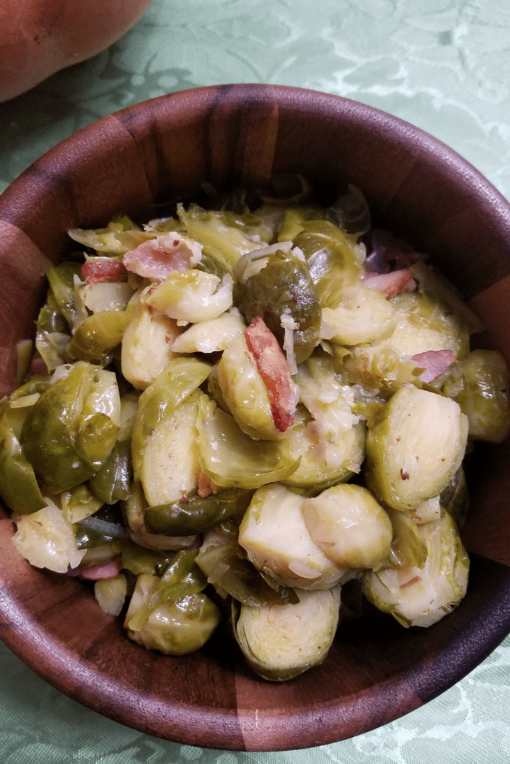 Instant Pot Brussels Sprouts with Bacon and Garlic are the perfect side dish for any meal! Make these in just a few minutes!
