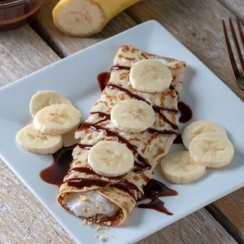These Chocolate Banana Butter Cup Crepes offer a healthy way to quench your sweet tooth! If you would rather a lower glycemic fruit you could substitute strawberries or raspberries in place of the banana.