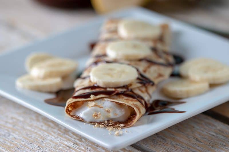 Weight Watchers chocolate banana crepes displayed on white square plate
