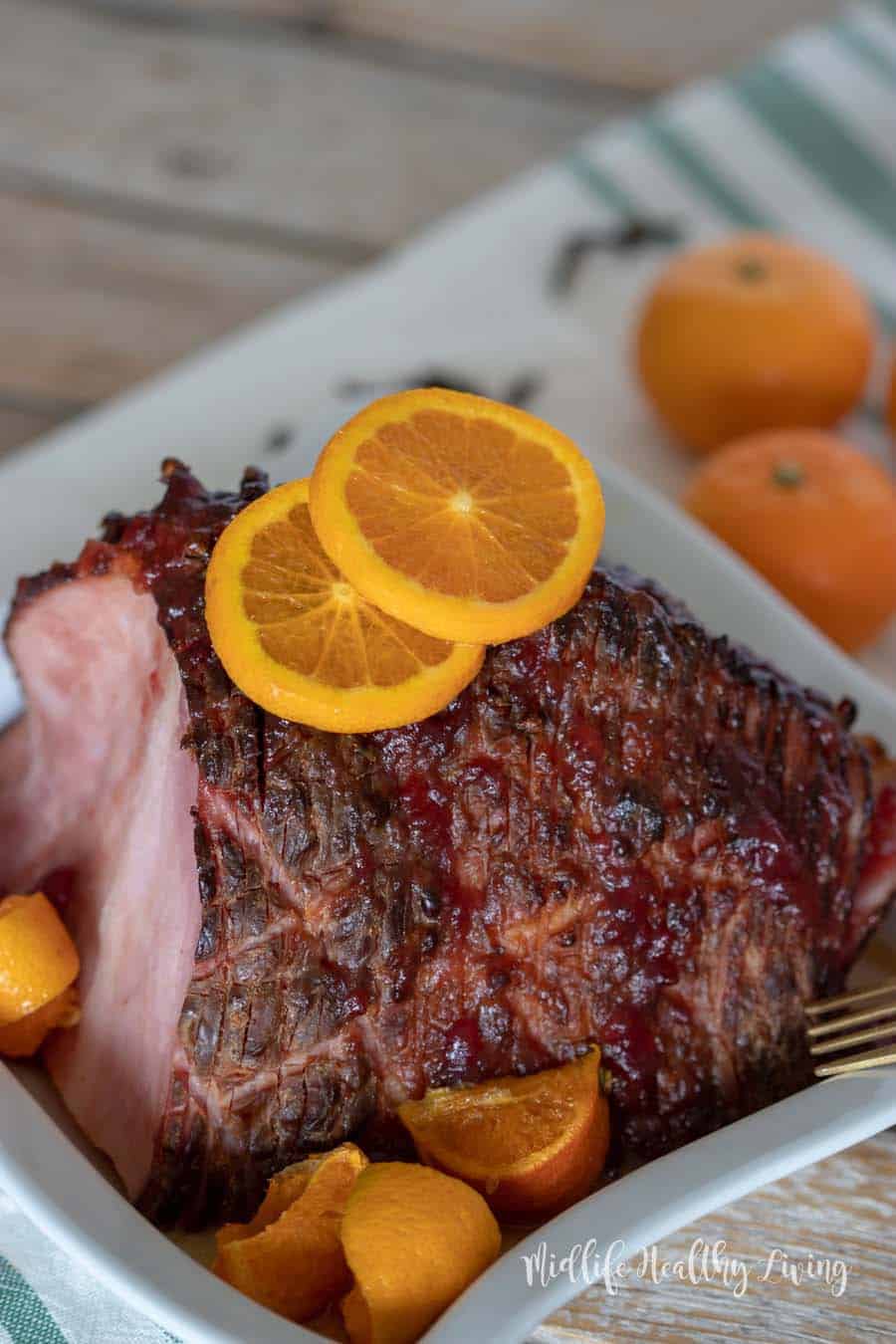 This Weight Watchers citrus and cranberry ham is a snap to make.  There are 5 Weight Watchers Freestyle Smart Points in each serving of this delicious ham.
