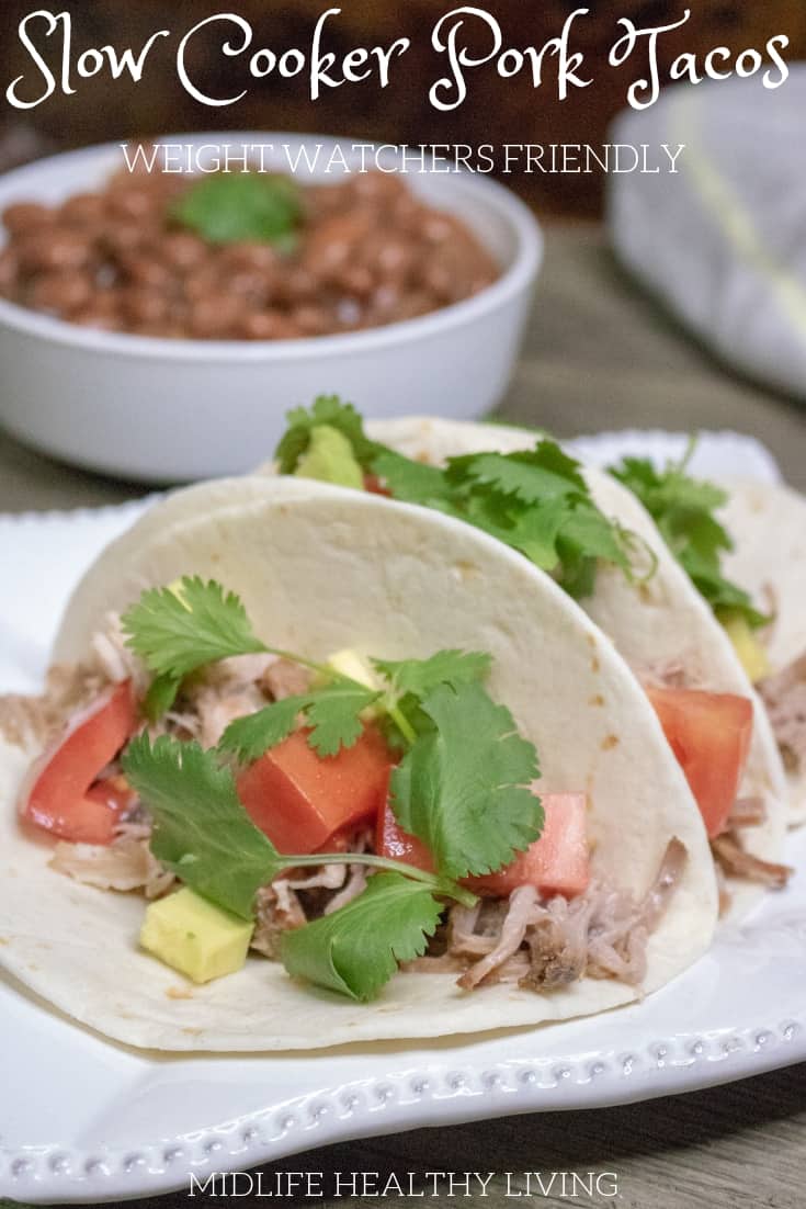 Need a quick and easy weeknight meal that can feed a crowd? These slow cooker pork tacos are a great family dinner recipe. The Crockpot does all the hard work, taco night has never tasted so good! 