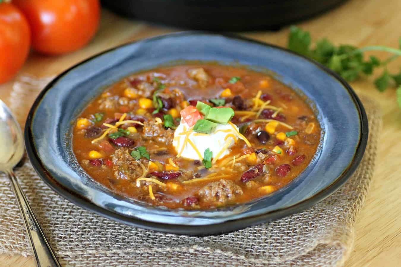 Healthy taco soup is a quick and easy weeknight dinner. This Instant Pot spicy taco soup could not be more delicious. The whole family will love it...they'll have no clue that it's totally Weight Watchers friendly! 