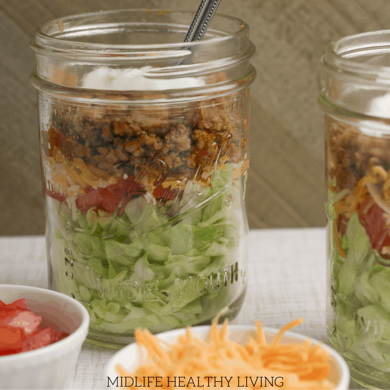 Have you tried making mason jar salads?! Give this taco salad in a jar a try and you'll be hooked! This easy to make and prep salad is the perfect Weight Watchers lunch recipe. 