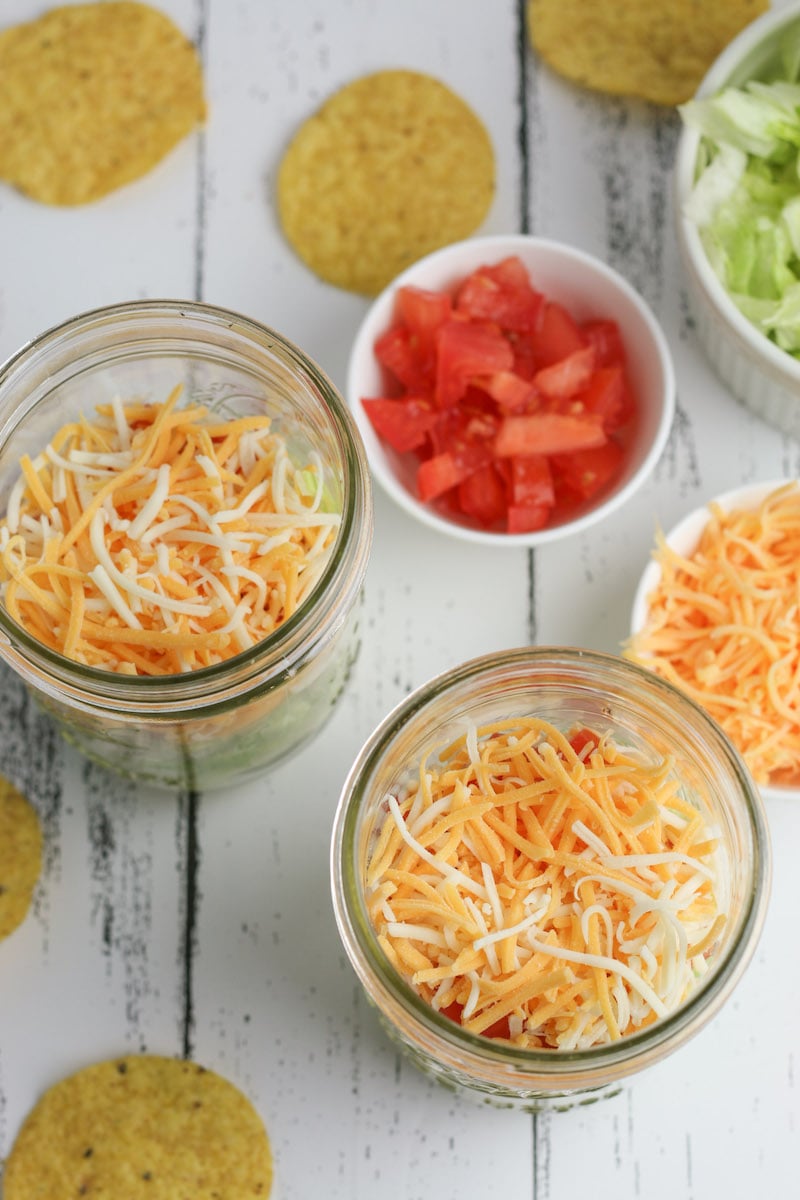 Adding cheese.