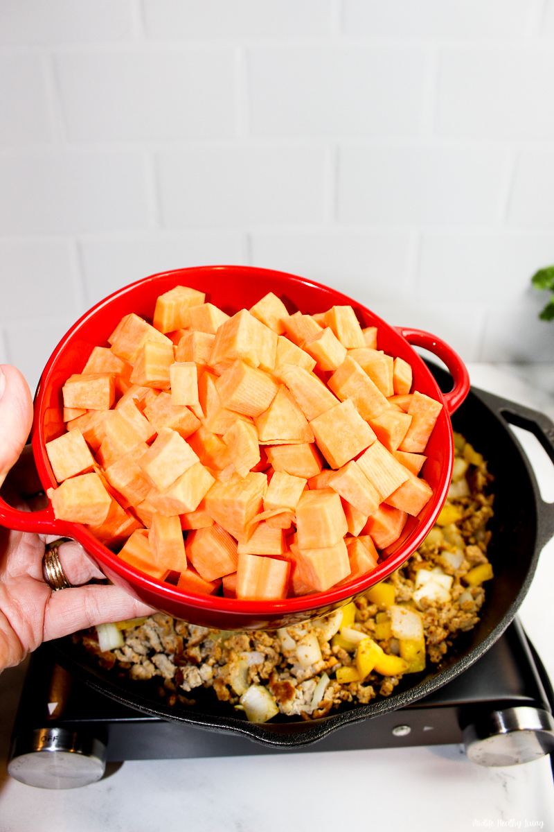 Sweet potatoes being added.