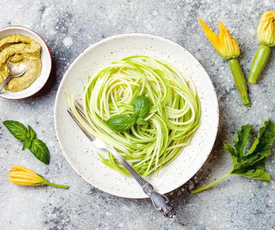 Zucchini noodles a.k.a. Zoodles are an excellent way to reduce carbs, calories, and points in any recipe. These are some of the best Weight Watchers zoodle recipes available. Zoodles are quick and easy to make with a spiralizer and they even cut down on cooking time! 