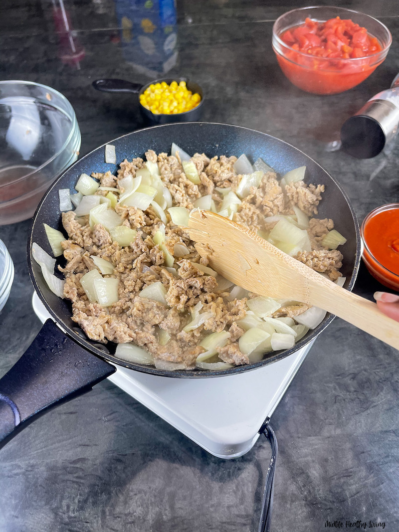 ground meat being cooked