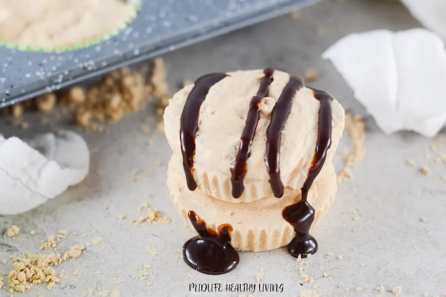 Finished peanut butter whips ready to eat with chocolate sauce on top. 