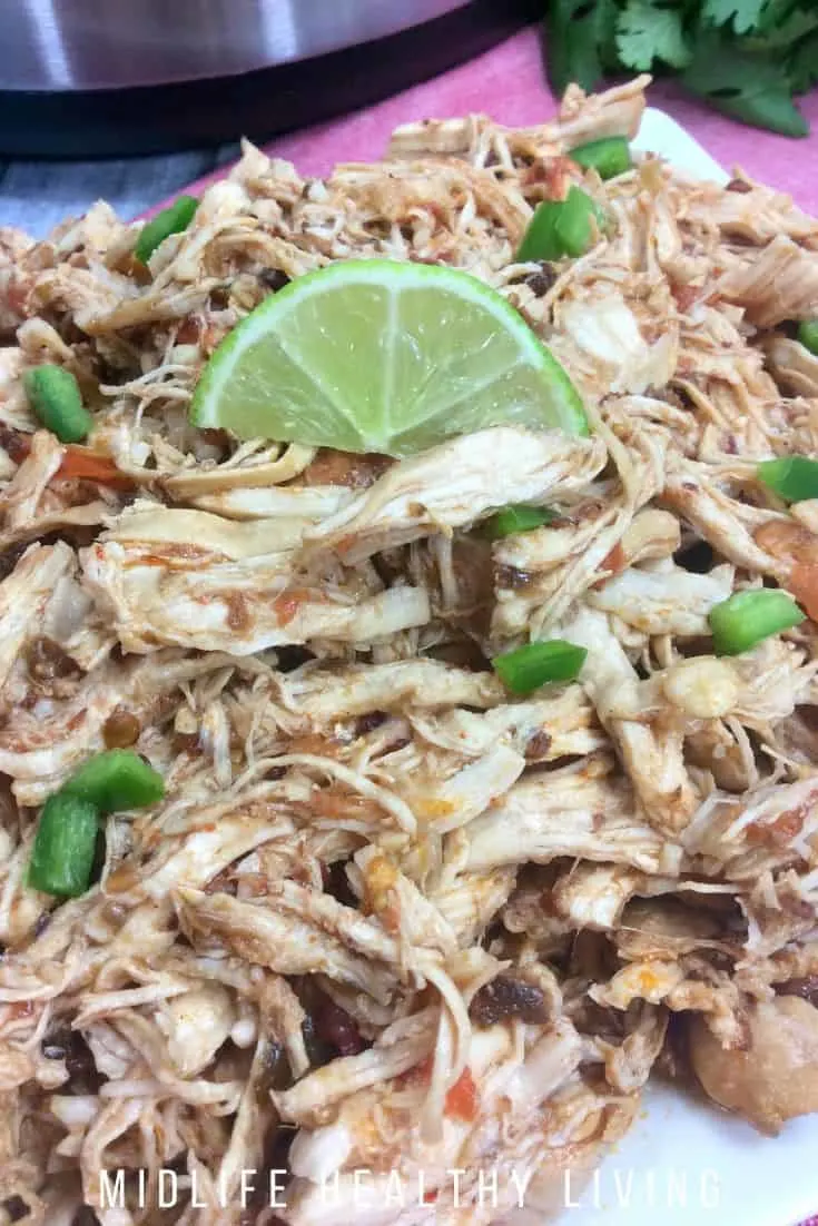 Close up shot of the finished shredded Mexican chicken