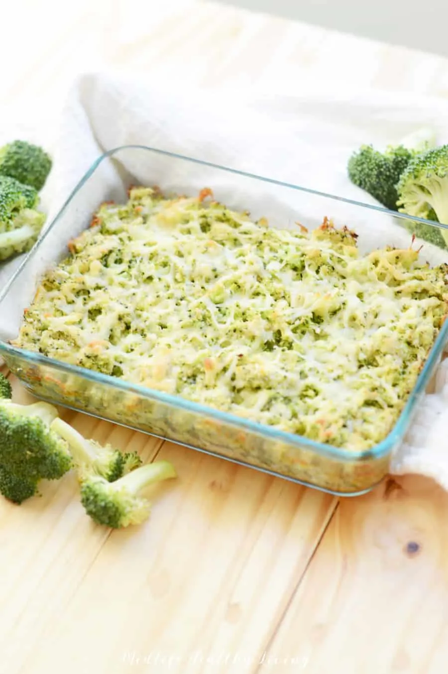 A vertical image showing the completed recipe for healthy broccoli parmesan dip.