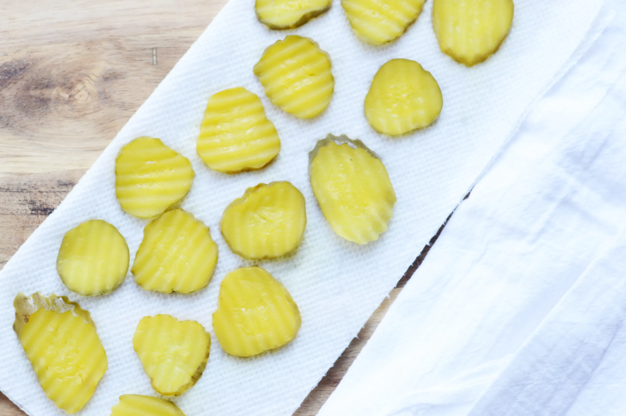 Air fryer recipes are my new favorite way to cut calories and lighten up delicious recipes. These air fryer pickles are a healthy fried pickle recipe that is even acceptable on Weight Watchers! 