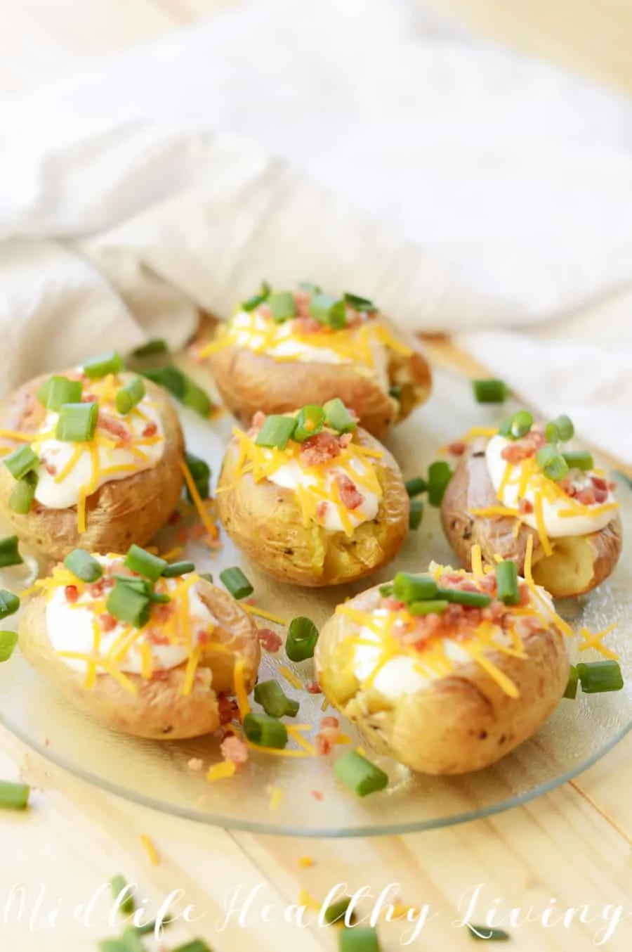Another beautiful shot of the finished loaded air fryer baked potatoes.