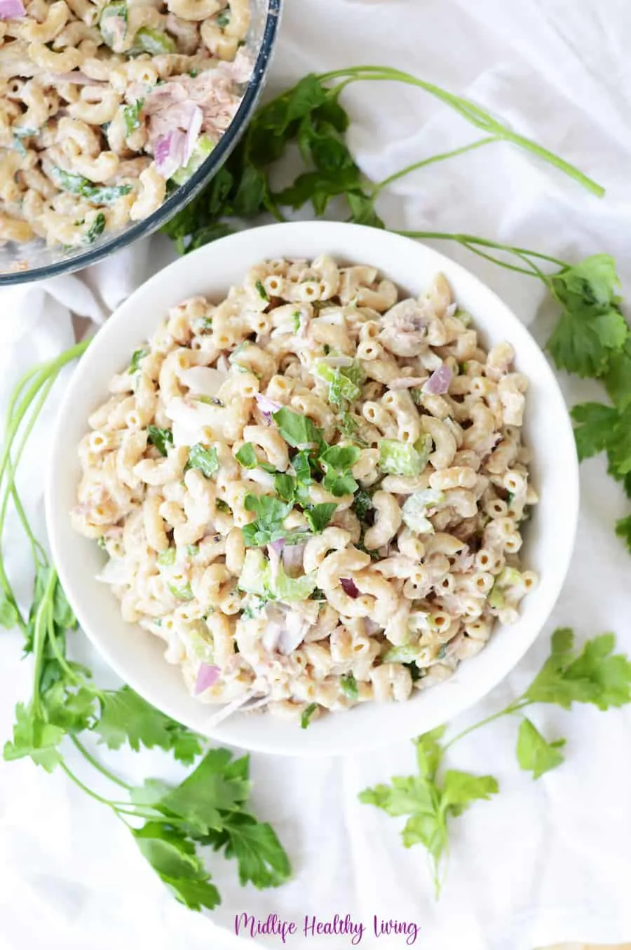 A vertical top down view of the finished macaroni salad.