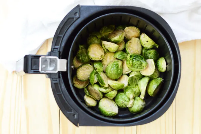 Using the air fryer to make healthy side dishes is easy and quick. These air fried Brussels sprouts are simple, delicious, and packed with nutrients. See all the best Weight Watchers air fryer recipes here!