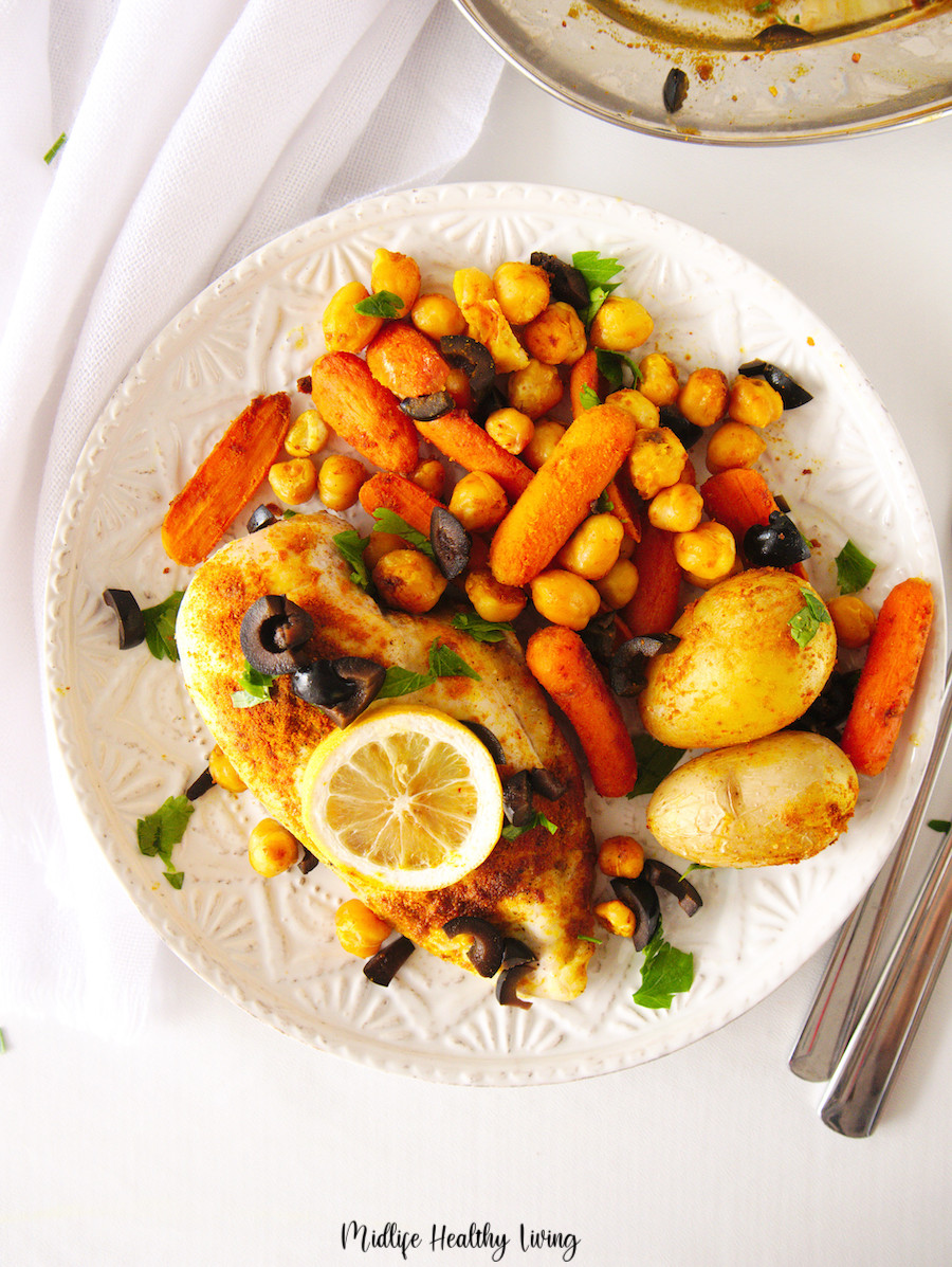 A top down look at a plate full of weight watchers chicken sheet pan dinner. 