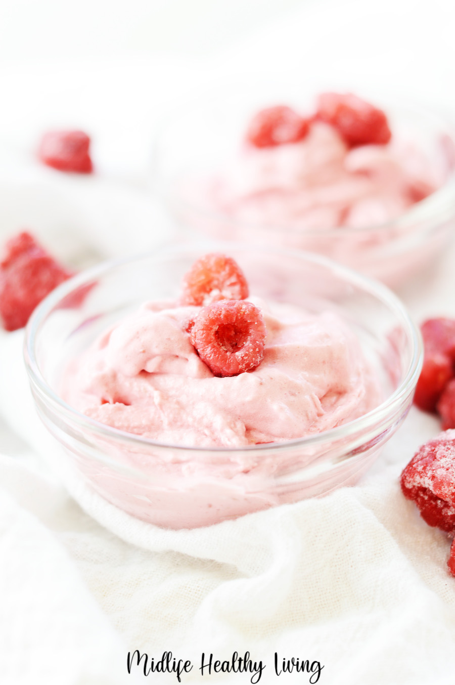 A look at the finished raspberry dessert in a glass bowl ready to eat. 