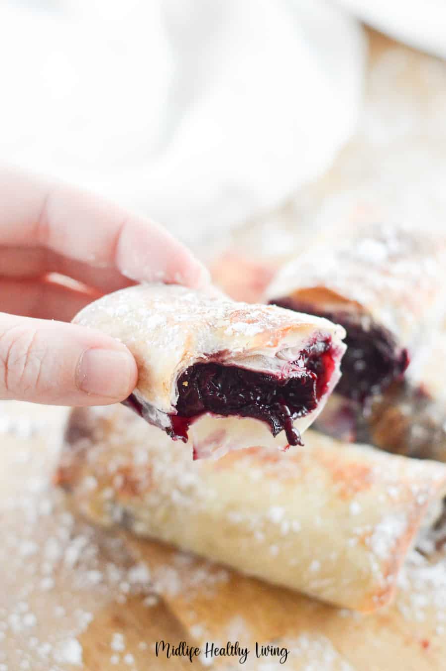 here we see a bite taken out of the cherry pie and you can see the cherry pie filling Walmart spilling out. 