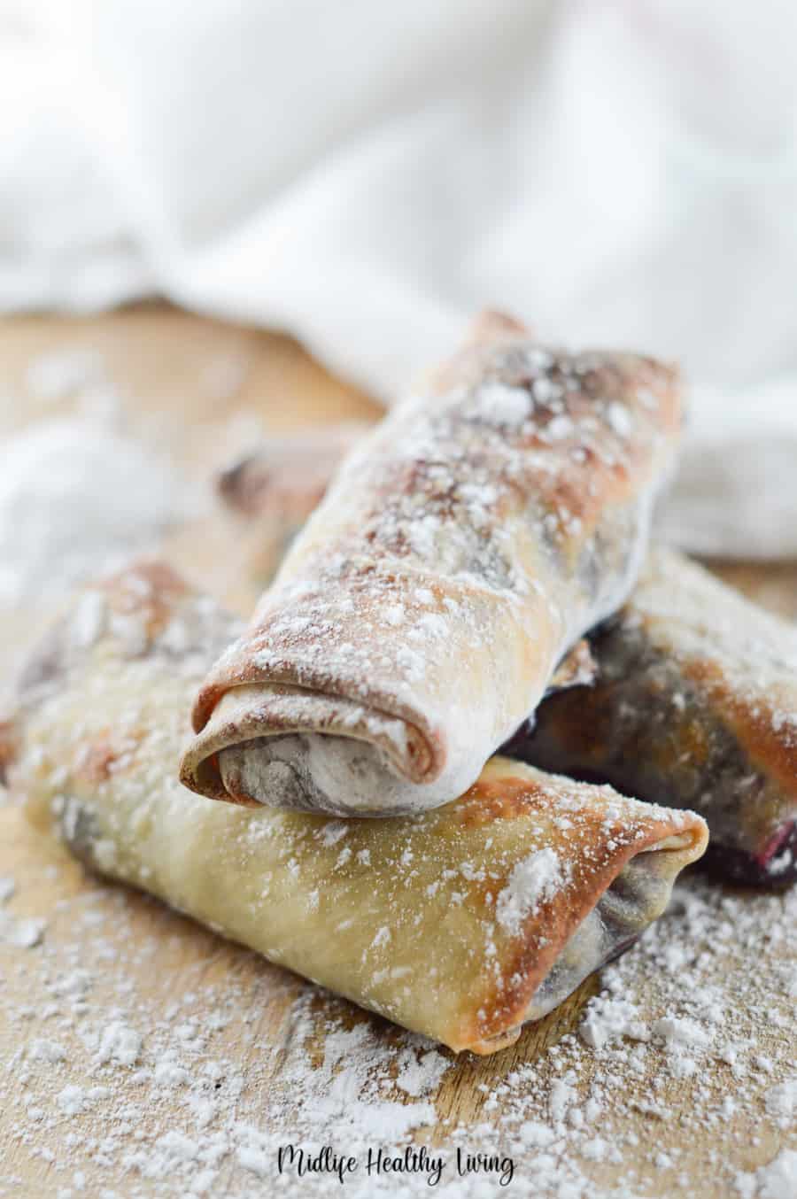 These perfectly crispy cherry pie recipe egg rolls are done and ready to be shared.