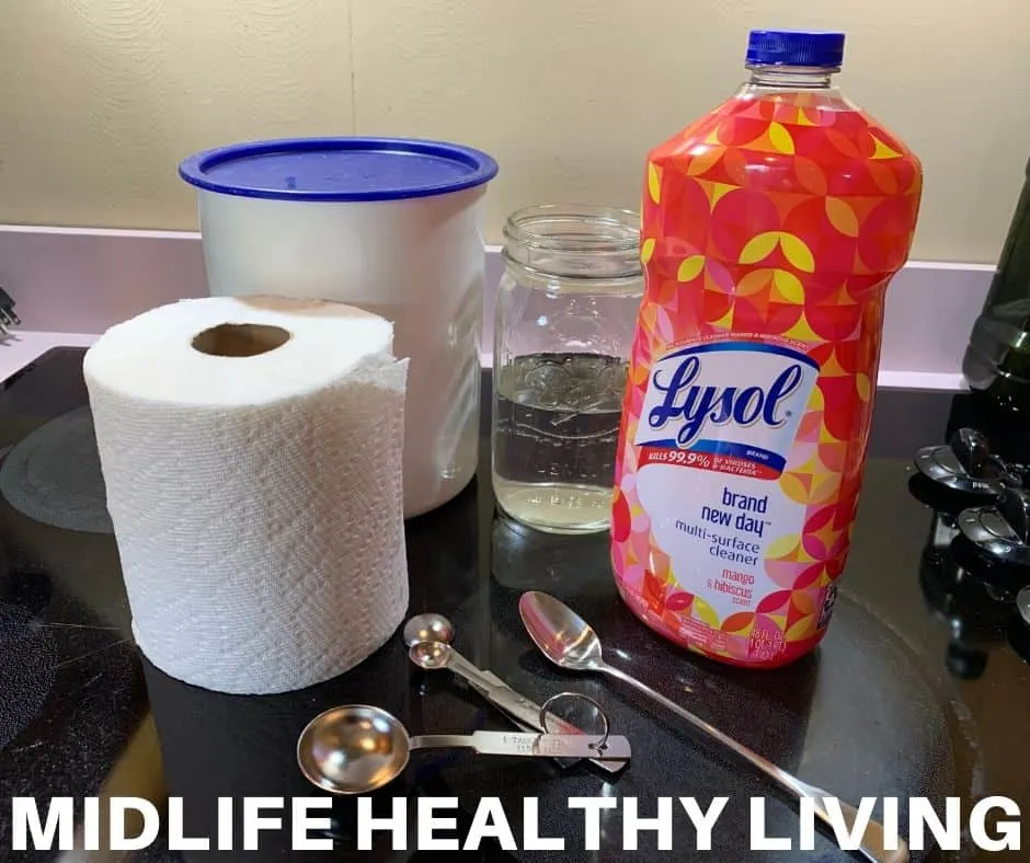 A picture showing the ingredients for DIY disinfecting wipes with Lysol cleaner.