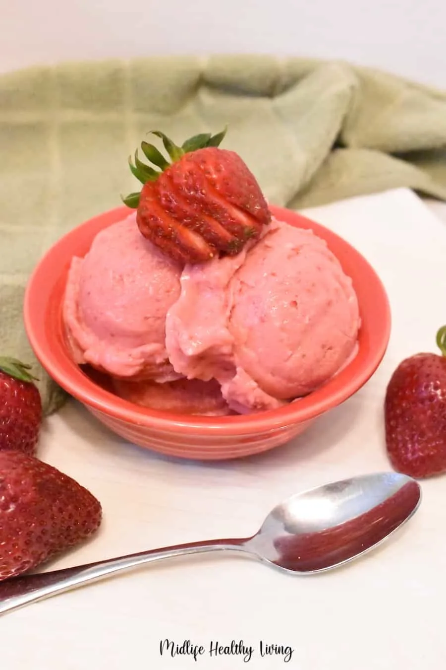 Here we see a dish full of the delicious WW strawberry frozen yogurt. 