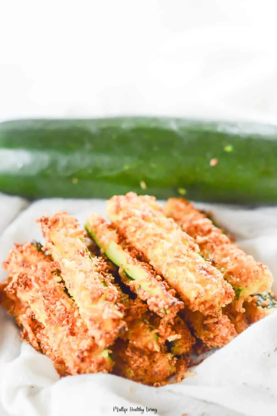 A pile of delicious zucchini fries ready to be shared. 