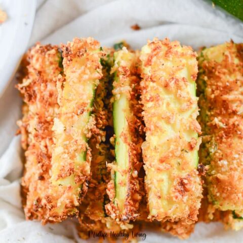 Featured image showing the finished zucchini fries recipe ready to be enjoyed.