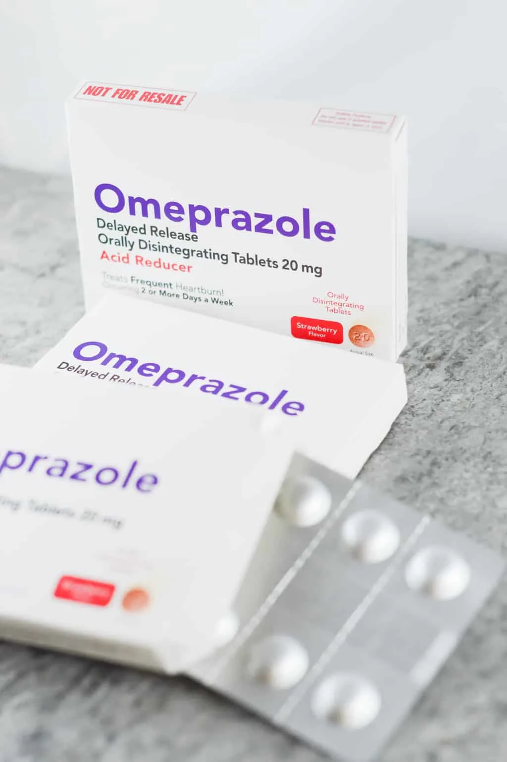 Packs of the omeprazole tablets shown for readers to see what I use!
