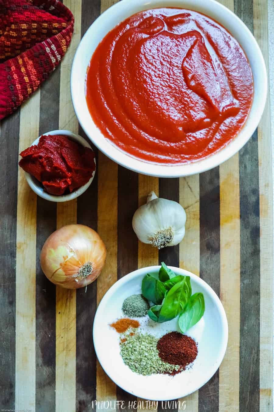 Here we have a featured image that shows the sauce ingredients for weight watchers spaghetti sauce recipe all laid out and ready to begin.