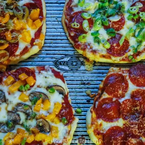 Featured image showing all kinds of finished WW pizza recipes with toppings.