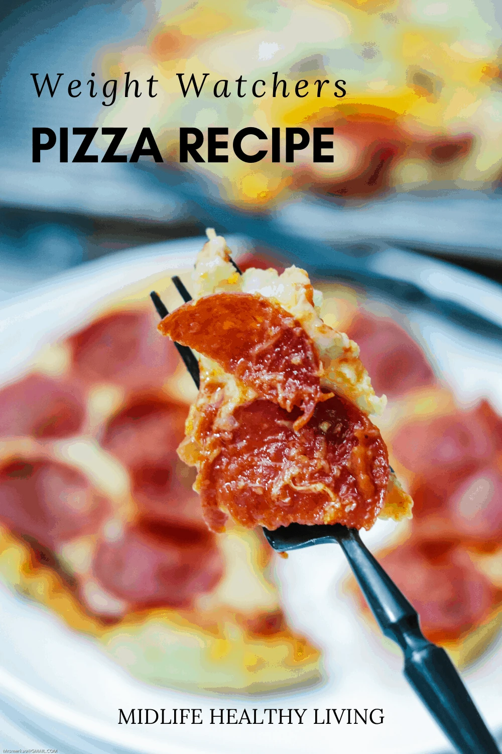 Here we have a pin showing the finished ww pizza recipe with a bite ready to be eaten.