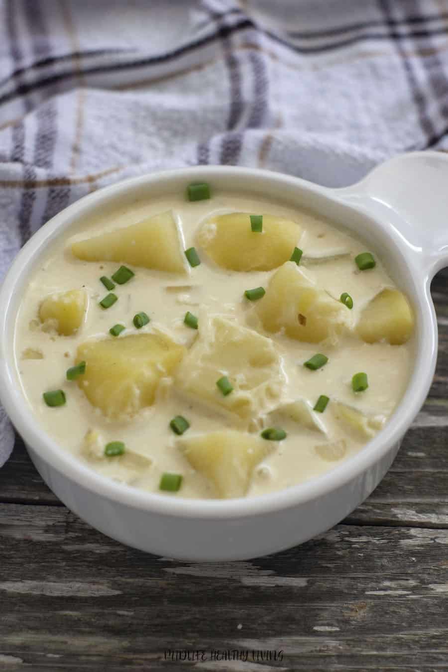 Here's a top down look at a full bowl of tasty potato soup! 