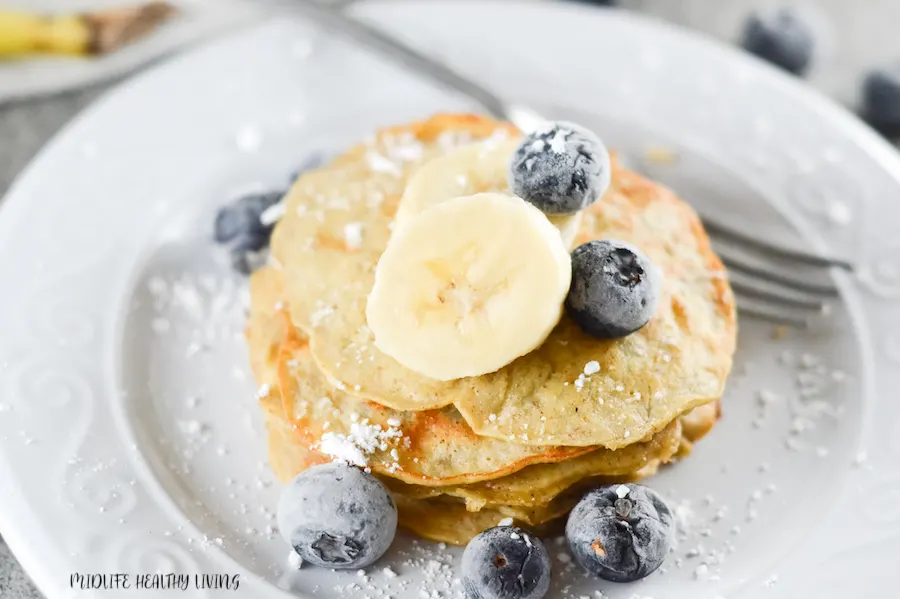 Featured image showing the finished banana pancakes for WW with blueberries on top ready to eat.