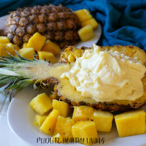 weight watchers dole whip recipe served in a hollowed out pineapple half.