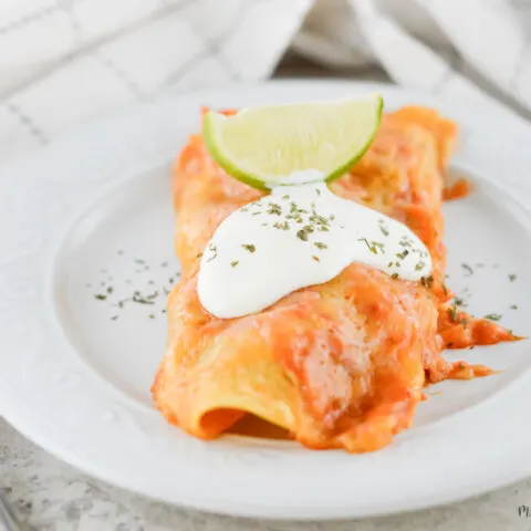 Featured image showing the finished weight watchers beef enchiladas ready to eat.