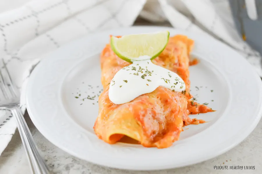 Featured image showing the finished weight watchers beef enchiladas ready to eat.