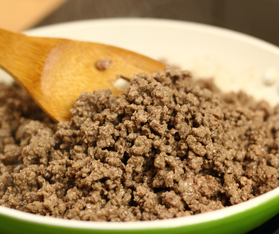 ground beef cooking in a skillet