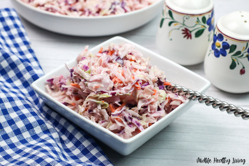 A bowl full of the finished coleslaw ready to eat.