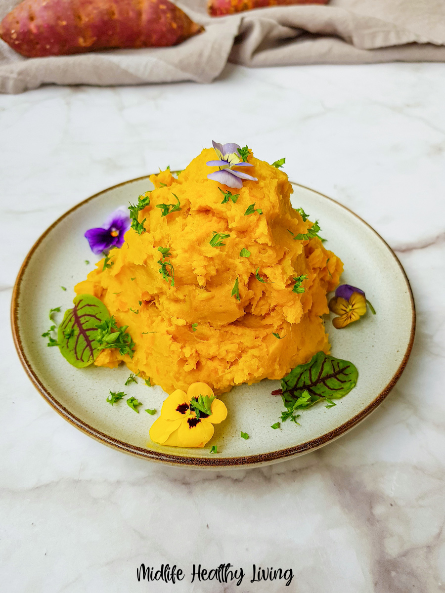A heaping plate of the finished mashed sweet potatoes for Weight Watchers ready to eat. 