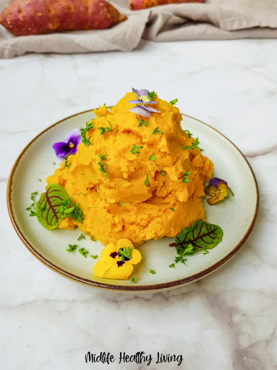A heaping plate of the finished mashed sweet potatoes for Weight Watchers ready to eat.