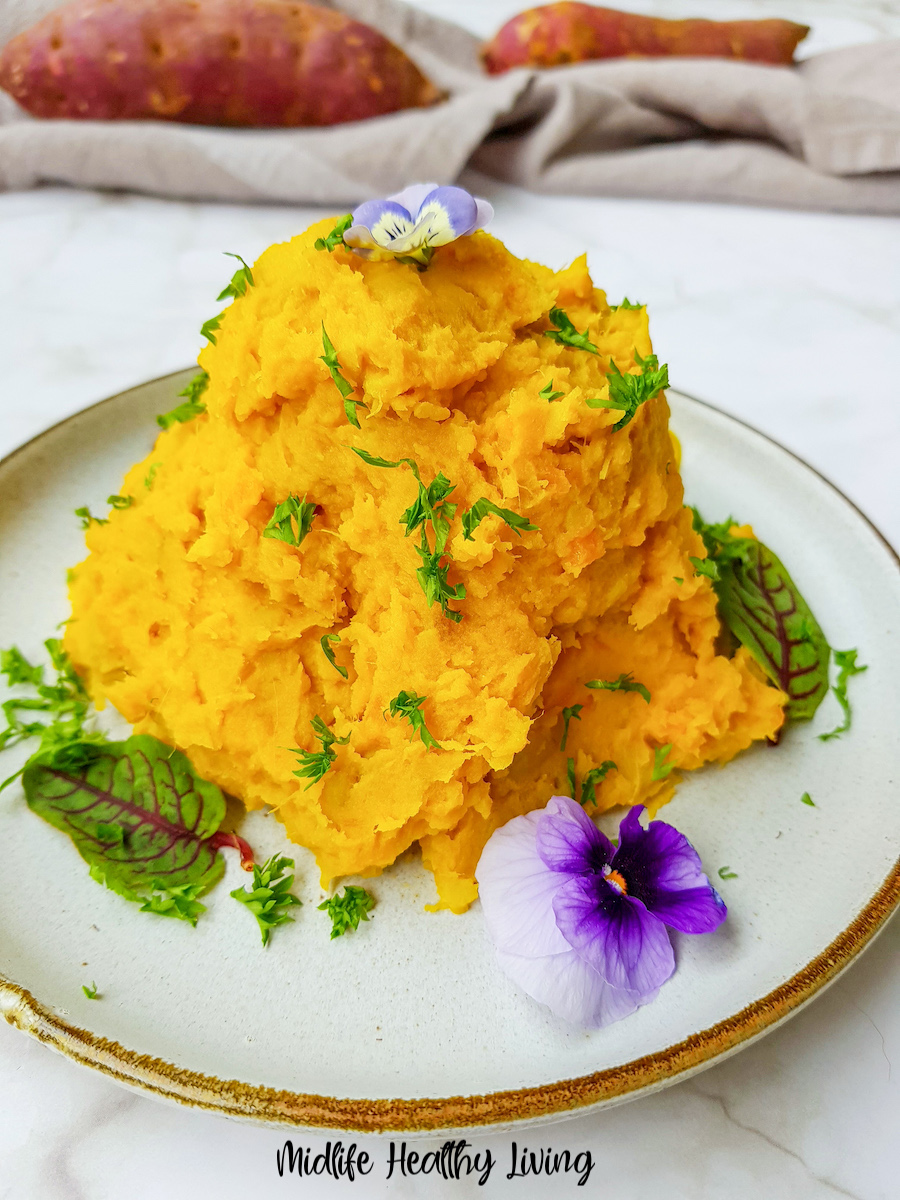 A close up view of the finished mashed sweet potatoes ready to serve. 