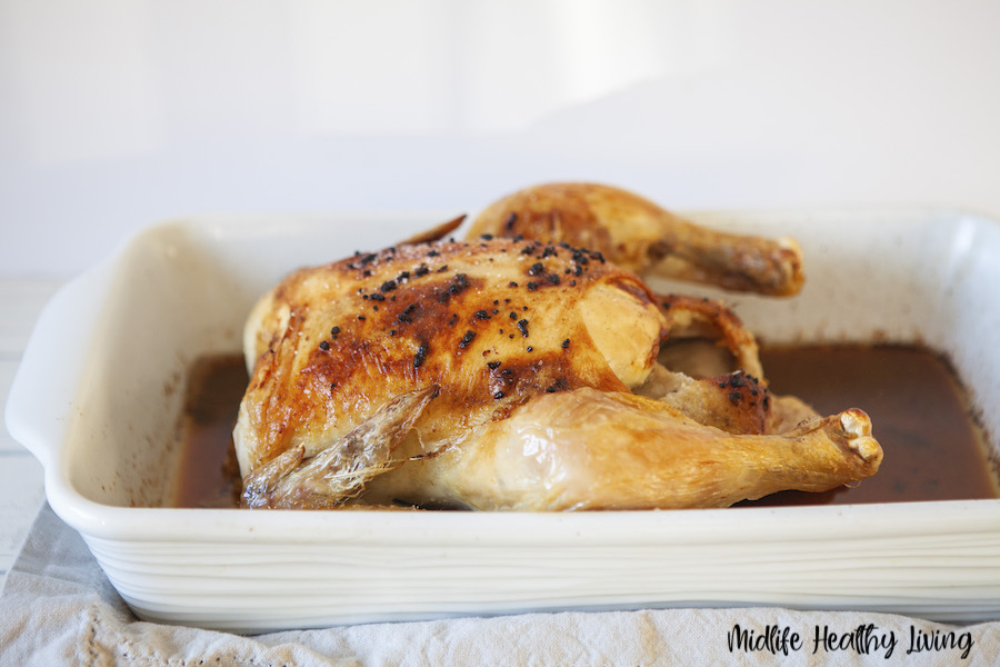 A side view of the finished roasted chicken ready to eat. 