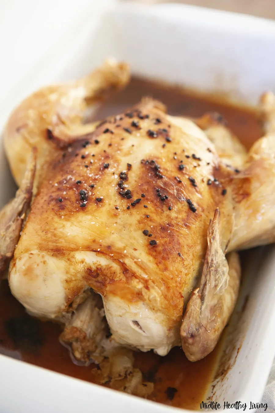 A close up of the finished weight watchers roasted chicken ready to cut and serve. 