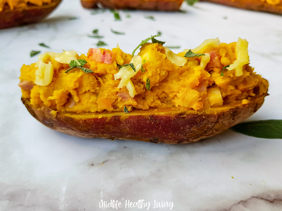 A side view of one of the finished weight watchers stuffed sweet potatoes ready to serve.