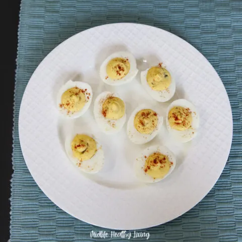 A full plate of finished weight watchers deviled eggs ready to eat.
